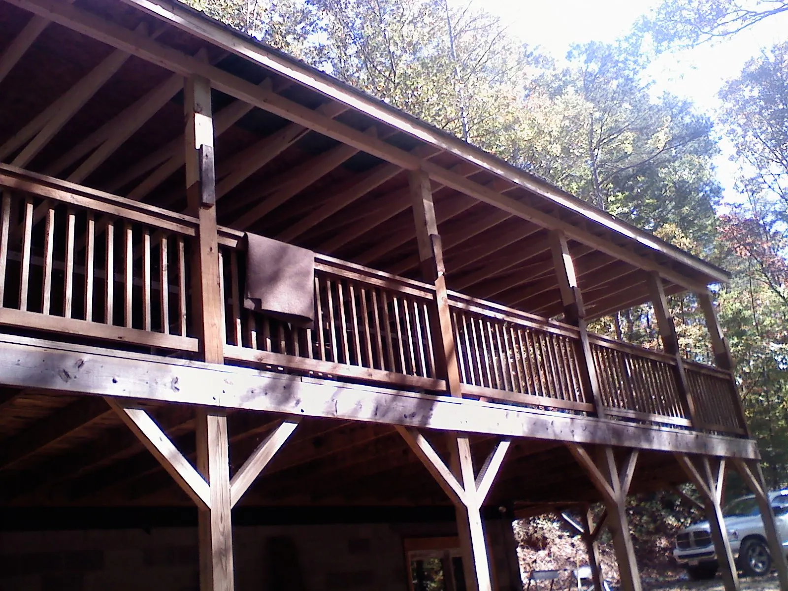 Timber framing under a new elevated porch and deck — Roof Leak Repair in Conklin by Roofing Brothers